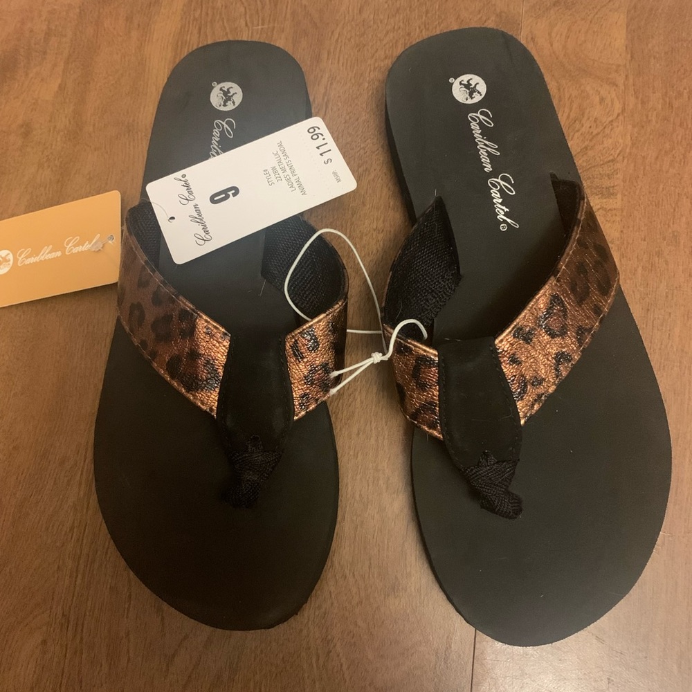 Leopard print black flip flops